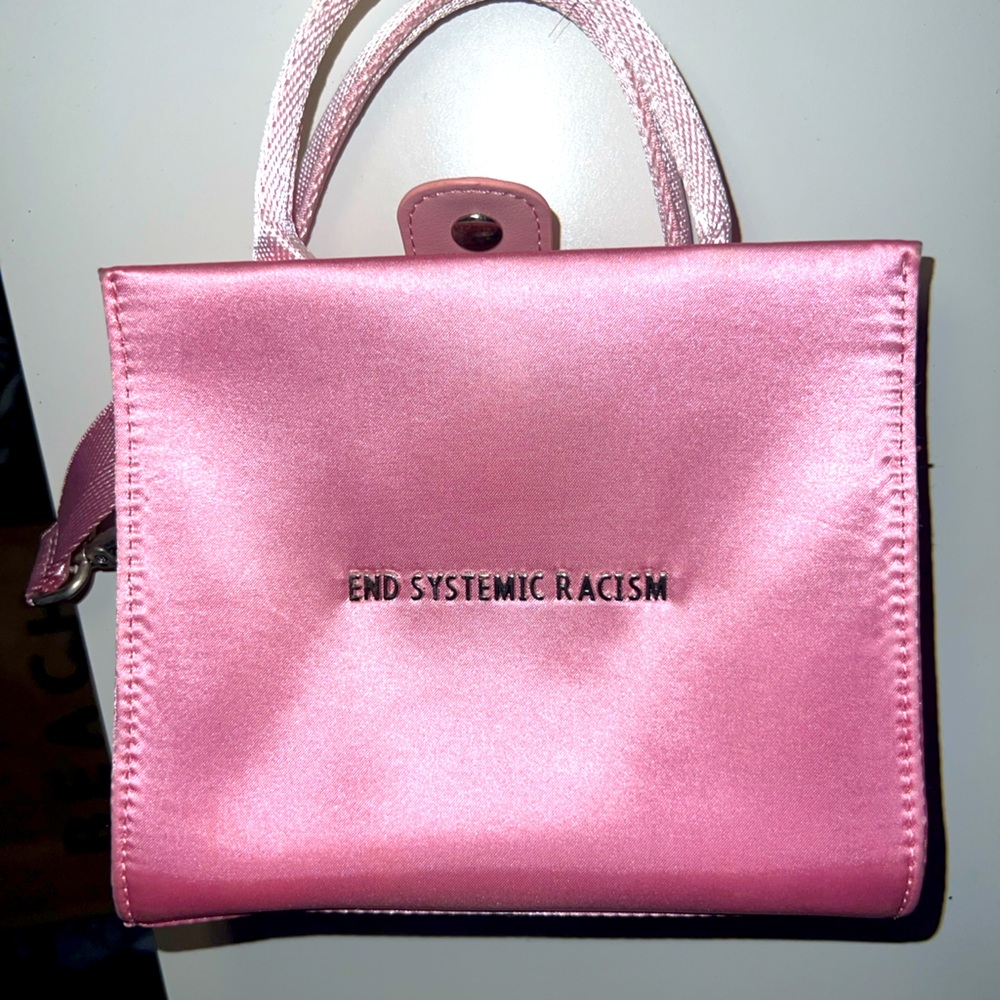 Pink Brandon Blackwood bag. End systematic racism
